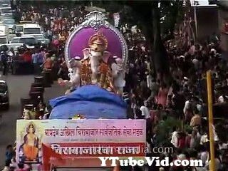 View Full Screen: devotees gather for a glimpse of passing ganesha statue.jpg