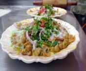 This video is for those who loves authentic Street Food Of Karachi because in this video i&#39;m going to try the Most Famous Chaat In Karachi and i&#39;m sure you&#39;ll going to love this video.&#60;br/&#62;&#60;br/&#62;Chandni Chatkhara is one of the most famous chaat shop in karachi which is located in shah faisal colony and they have variety of street food, fast food and continental food but they have the Best Chana Chaat In Karachi which is famous in the whole city of karachi.&#60;br/&#62;&#60;br/&#62;Their channa chaat have variety of chatnis like Meethi Chatni, Khatti Chatni and their Raita which are all handmade which makes their chaat so delicious and tasty. Their warm channe which is slowly cooked in their boiled water infront of your eyes are also making this Channa Chaat different from other chaat shops of karachi.&#60;br/&#62;&#60;br/&#62;They also have Gol Gappay which is also known as Pani Puri and that too taste great when you enjoy your meal sitting their in great environment. Their Chaat and Gol Gappay are the most famous in the whole karachi city and i&#39;ll highly recommend you to try the Most Famous Chaat In Karachi by Chandni Chatkhara.&#60;br/&#62;&#60;br/&#62;If you love Karachi Street Food so this video will surely help you in choosing the Best Chaana Chaat Of Karachi.&#60;br/&#62;&#60;br/&#62;If you love our work so share this video with you family and friends and also put you positive feedback and suggestion in the comment box this will boost our passion for work and help us by SUBSCRIBE our channel :)&#60;br/&#62;&#60;br/&#62;Price 90 Rupees Per Plate&#60;br/&#62;0.80 &#36;&#60;br/&#62;&#60;br/&#62;Pricing : 10/10&#60;br/&#62;Sitting &amp; Environment :10/10&#60;br/&#62;Taste : 10/8&#60;br/&#62;&#60;br/&#62;Location : https://goo.gl/maps/VRBRnSCqmA98MfEo7